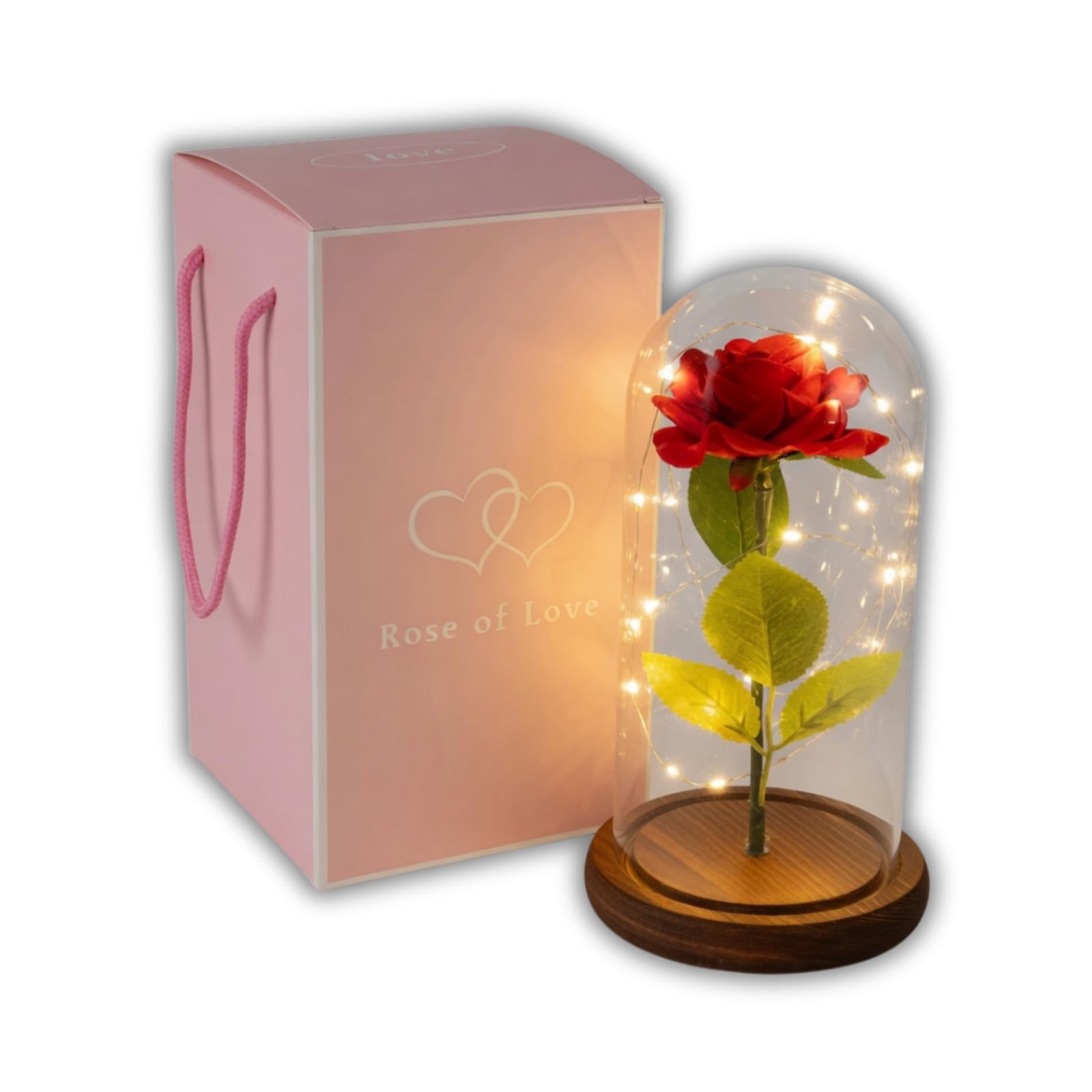 Rose éternelle sous cloche allumée à côté de son coffret rose Rose of Love