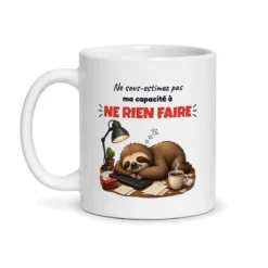 Mug humour travail Ne sous-estimez pas ma capacité à ne rien faire, vue de face
