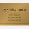 Plaque ORL personnalisée en plexiglas or vieilli 30 × 20 cm, exemple au nom de Dr Nicolas Garnier